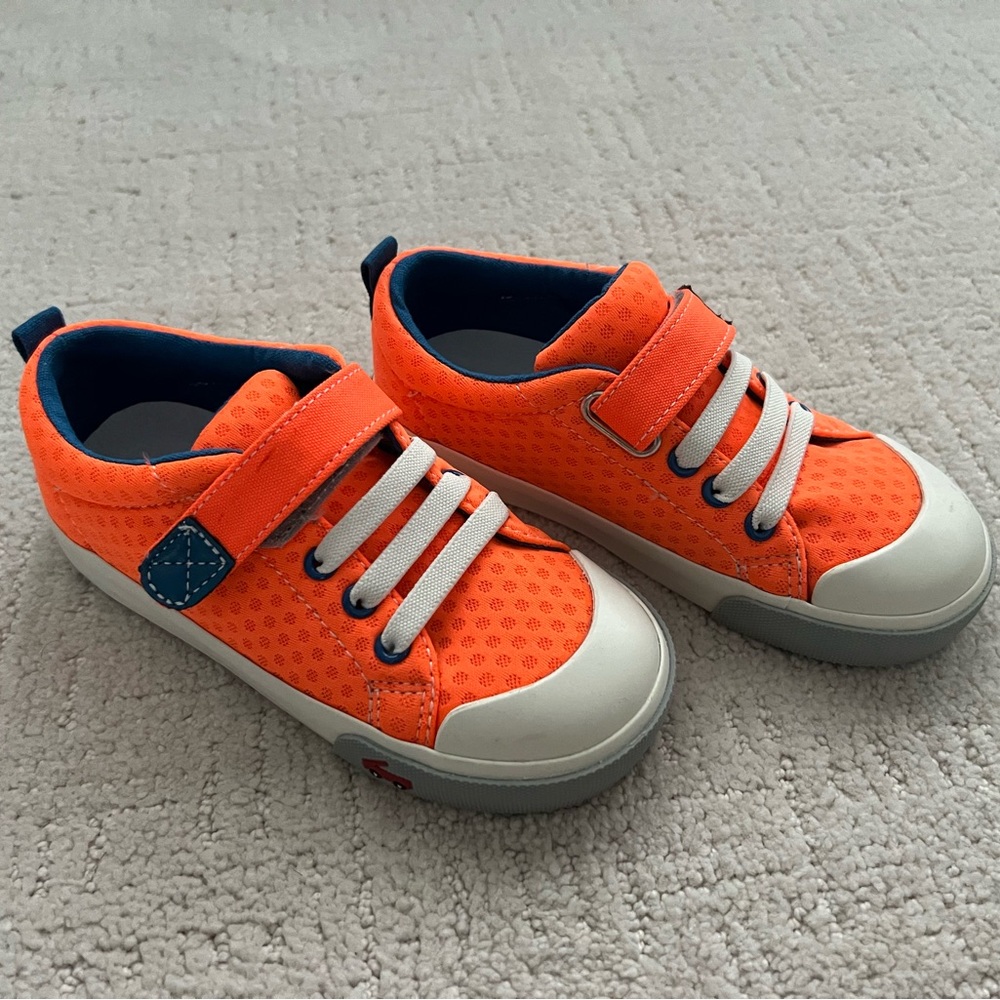 Bright neon orange sneakers